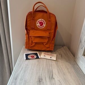 Fjallraven Kånken Mini Backpack in Bright Orange